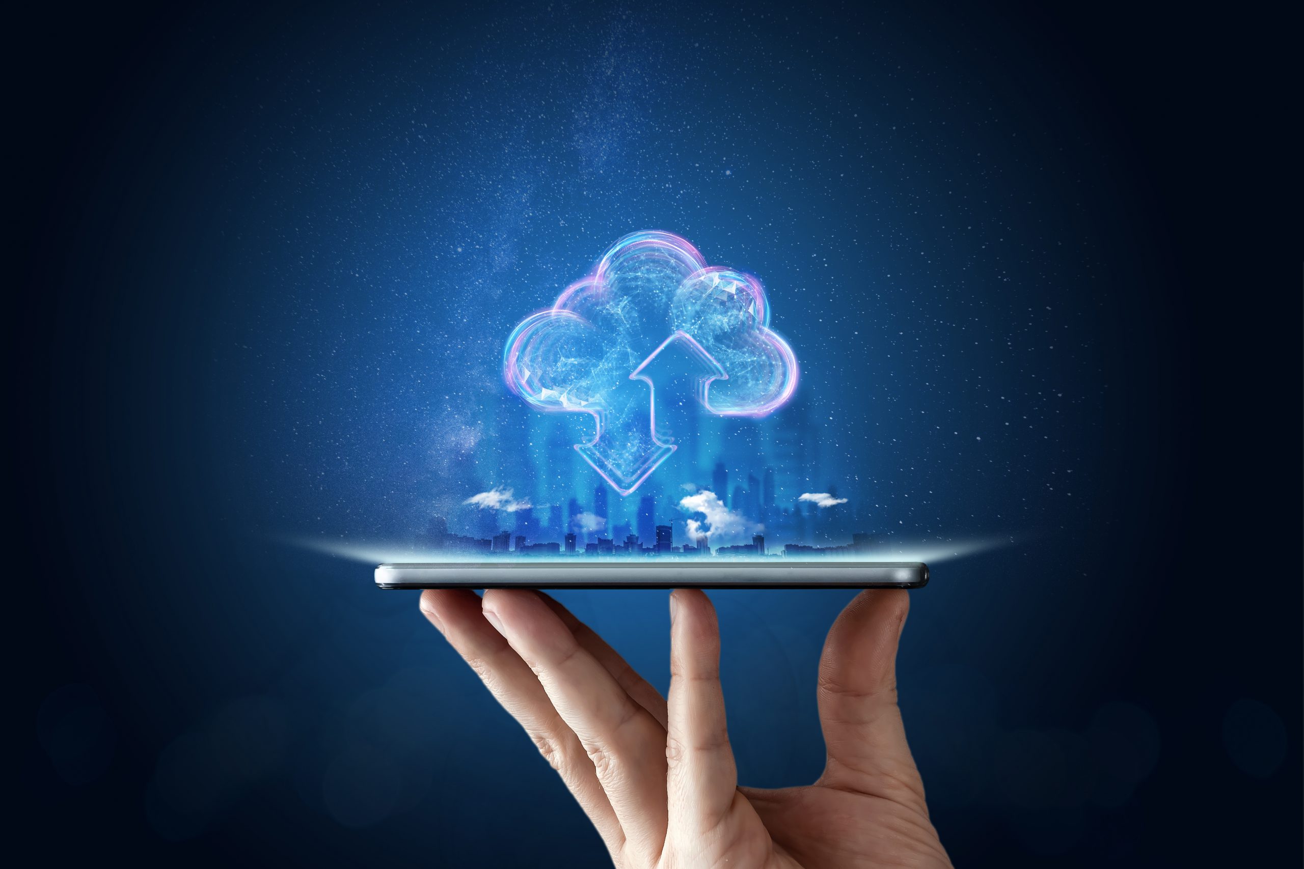 Creative background, male hand with the phone, the image of the hologram of the cloud, blue background. The concept of cloud technology, cloud storage, a new generation of networks. Mixed media.